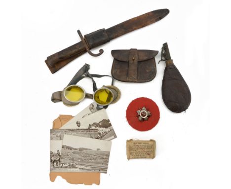 Collection of military items, including pilot googles, ammunition pouch, leather powder flask etc 