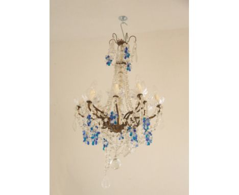A FRENCH CUT GLASS TWELVE-LIGHT CHANDELIER 20th century, the gilt metal scrolling branches with blue coloured glass drops, ap