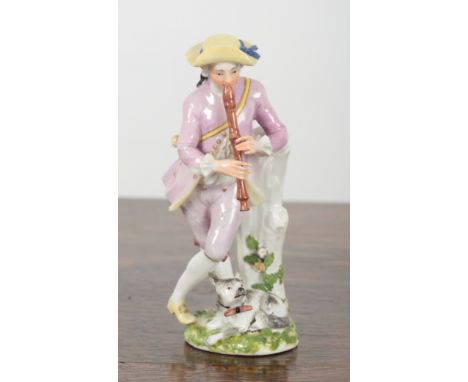 A DRESDEN PORCELAIN, PROBABLY MEISSEN, FIGURE OF A SHEPHERD 18th century, modelled playing the flute and leaning against rust