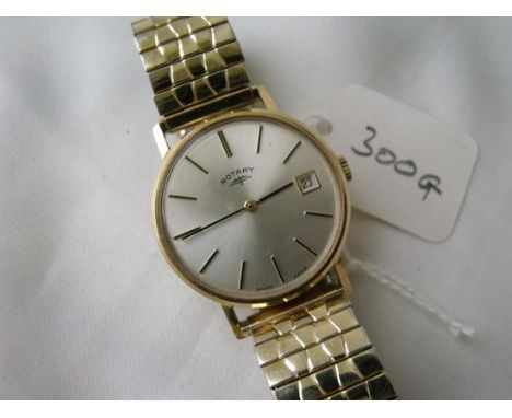 Gents rotary 9ct wrist watch with date aperture on  metal strap        