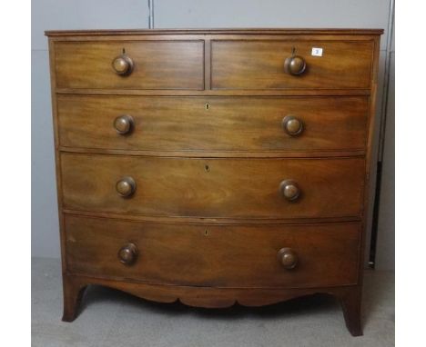 C19th Bow Fronted Mahogany Chest of 2 Short & 3 Long Graduated Cock Beaded Drawers with turned bun handles, on swept bracket 