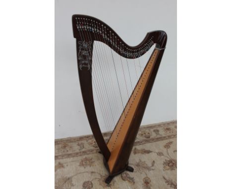 A French Camac lever Noyer Harp, K38, 141.5cm high  CONDITION REPORT: Some strings need replacing, the surface scratches and 