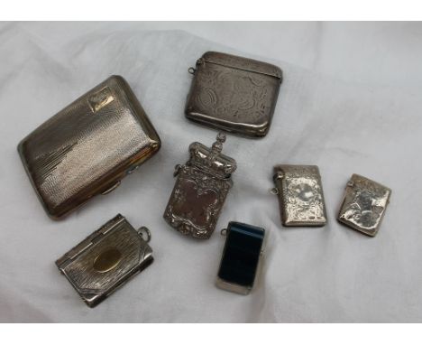 A George V silver cigarette case, of rectangular form with engine turned decoration, Birmingham, 1909, together with three si
