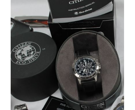 A Citizen Eco Drive WR 200 Titanium gentleman's wristwatch on a leather strap, together with two other Citizen Eco Drive wris