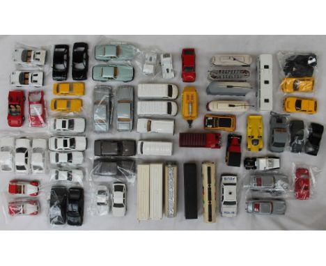 A collection of Corgi cars, vans trams etc dating from around 1985/86 including 007 Aston Martin DB5, Citroen 2CV6, Ferrari 3