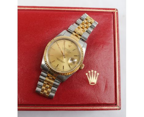 A Gentleman's Rolex Oyster perpetual datejust superlative chronometer, with a two tone strap, with a gilt dial and batons, No