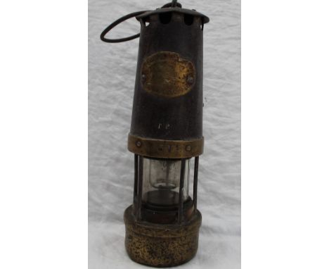 A Thomas and Williams No.4 steel and brass miner's lamp, 32cm high