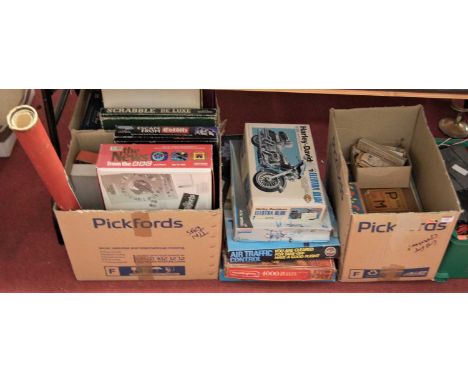 A large collection of assorted plastic kits, board games, and childrens toys, to include a boxed Film Stips Junior Television