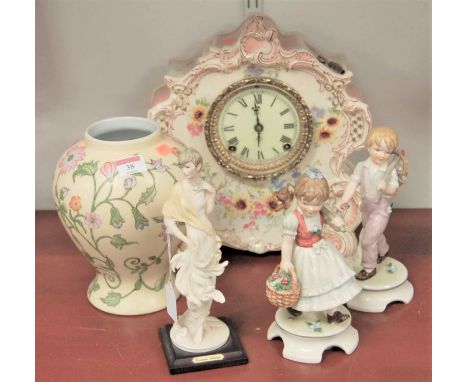 Mixed ceramics to include mantel clock, two Hummel figures, baluster vase and resin figure (5)Condition report: No cracks, lo