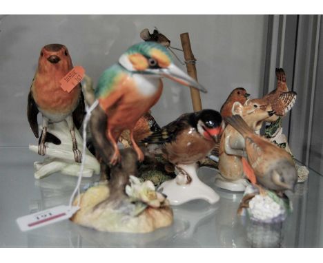 A collection of assorted bird and animal figures, to include Royal Crown Derby Kingfisher, Goebel European Goldfinch, Royal W
