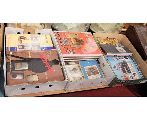 Three boxes of various cigarette lighter books to include The Vietnam Zippo 1933-1975 by Jim Fiorella, Zippo: An American Leg