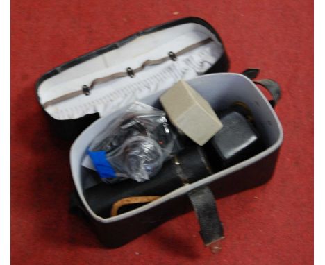 A leather case containing a quantity of mixed photography equipment, to include a Mamiya 1000 TL camera etc 