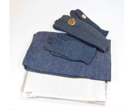 A post WWII RAF serviceman's side cap, together with a pair of blue woollen gloves, scarf, and handwritten military notebook