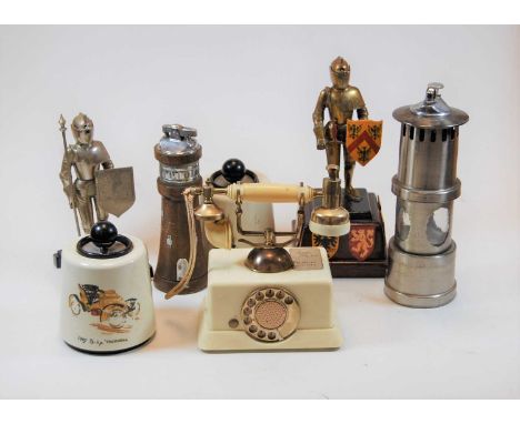 A novelty table lighter in the form of a miner's safety lamp together with various other lighters to include Dorset Light Ind