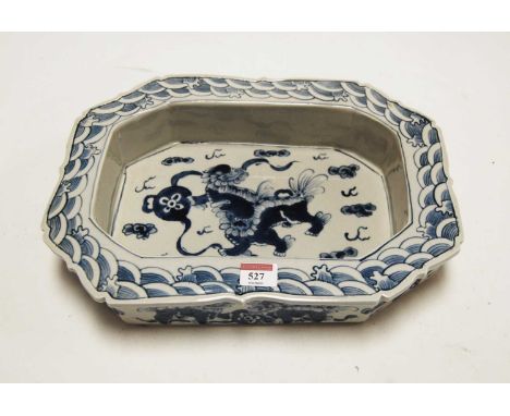 A late 20th century blue and white Chinese ceramic octagonal shallow bowl, decorated with mythical creatures