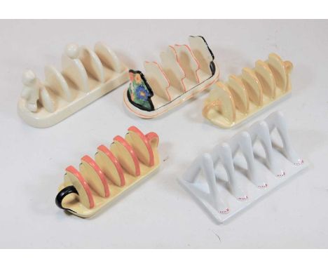An Art Deco Carltonware four-division toast rack, typically decorated in shades of orange and black; together with two other 