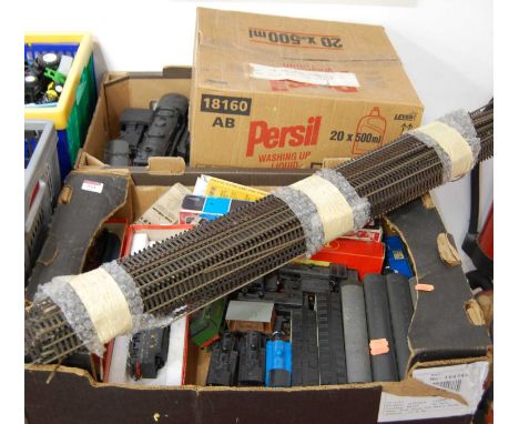 Three boxes containing a quantity of mixed scale 00 gauge and 0 gauge trains and accessories, to include Hornby, Lima etc