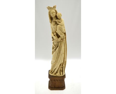 A 1930's French cast celluloid figure, Madonna and Child, 52 cm, on wooden plinth