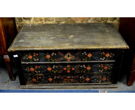 An antique Hungarian stained and polychrome decorated trunk, 50 cm high x 110 cm wide x 61 cm