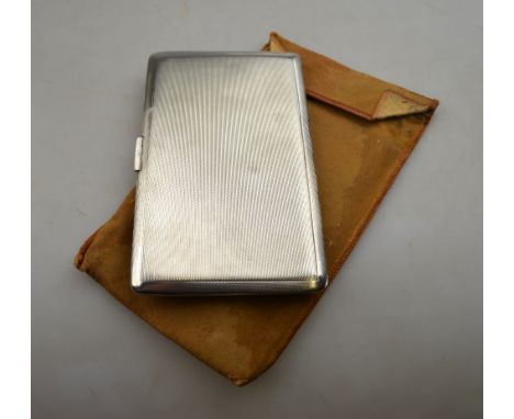 A heavy quality engine-turned silver cigarette case, DRH, Birmingham 1945, 7 oz Condition Report Shallow dents and surface sc