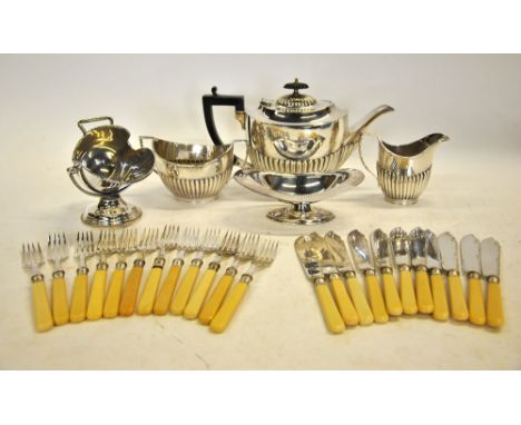 An oval three-piece half-reeded electroplated tea service, to/w a sugar scuttle, oval bonbon dish and a set of fish knives an