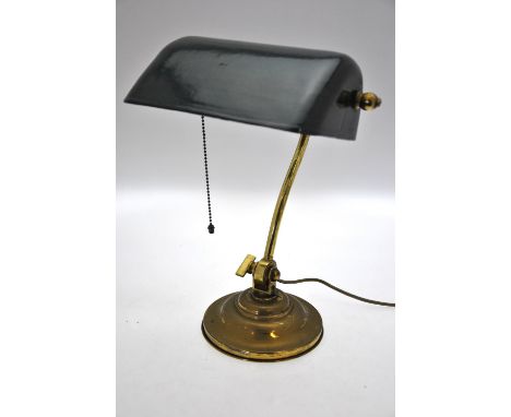 A vintage lacquered brass adjustable arm desk lamp with enamelled shade