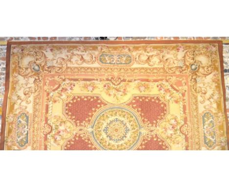 A French aubusson style carpet in the classical style, 300 x 235 cm