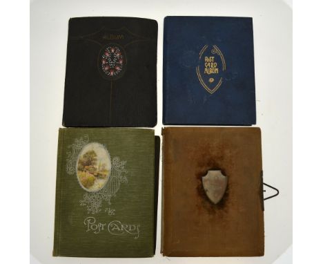 Three albums of Edwardian and later postcards, including humorous, greetings, topographical, etc., to/w a Victorian album of 