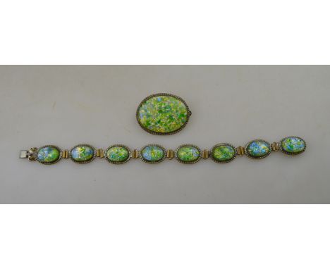 A vintage bracelet formed of blue and green Venetian glass with metal bead edge settings to/w matching brooch (2)