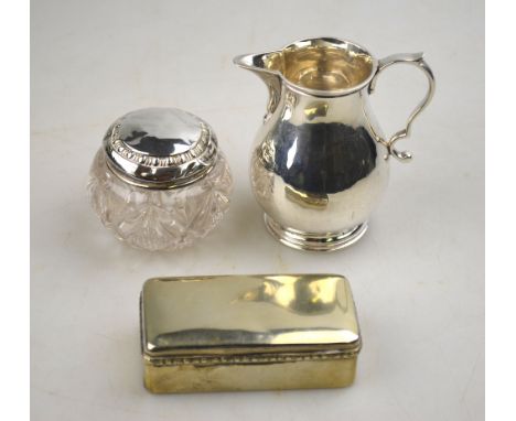 A small silver sparrow-beak cream jug in the Georgian manner, London 1940, to/w a silver-topped glass rouge pot and an electr