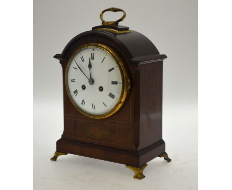 A late 19th century satinwood dome cased mantel clock having an 8-day two train movement striking on a spiral gong, the white