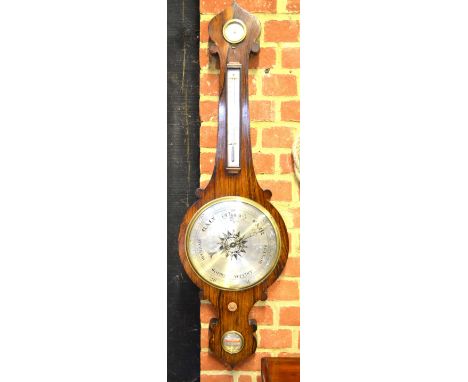 D Albino, a Victorian rosewood wheel barometer with silvered dial, level, thermometer and dry/damp register, 30 cm diam x 102