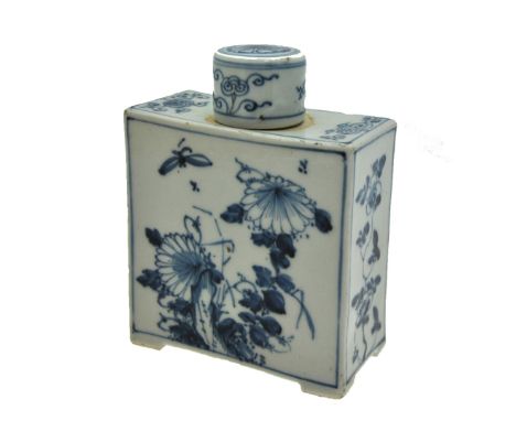 A Chinese blue and white 18th century rectangular tea caddy and cover decorated with butterflies amidst chrysanthemums and pe