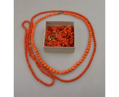 Two rows of coral beads, box of loose stick coral, silver and enamelled locket, two stick pins - one stage and one wishbone, 