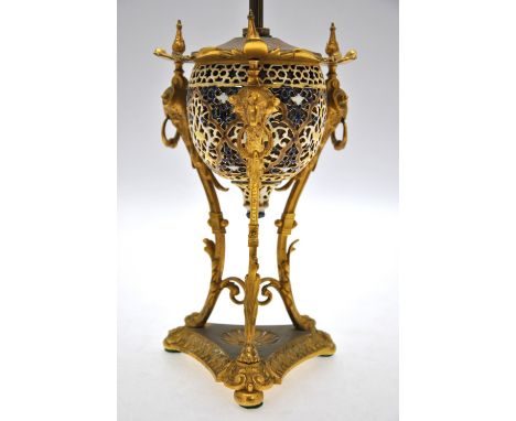 An ornate cast brass desk-stand, to/w a Zsolnay Pecs reticulated pottery and gilt metal lamp-base (2) Condition Report Lamp b