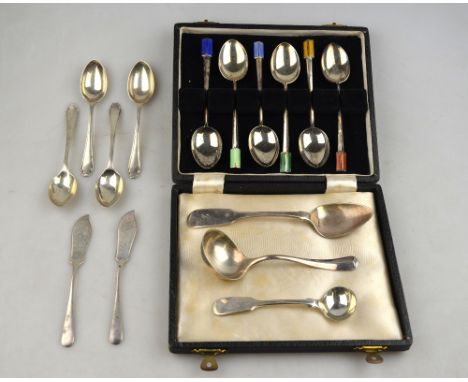 A cased set of six Art Deco teaspoons with harlequin enamelled finials William Suckling, Birmingham 1938, to/w a small quanti