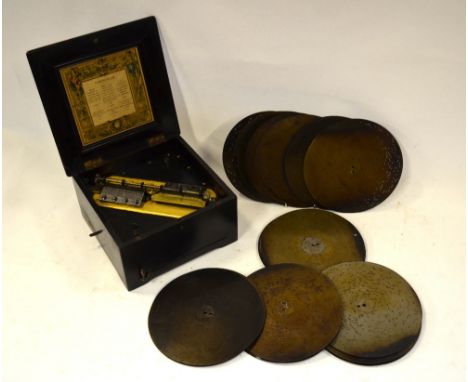 A Symphonium polyphon in ebonised case, to/w a selection of 27 cm dia. discs (27) Condition Report working/playing condition,