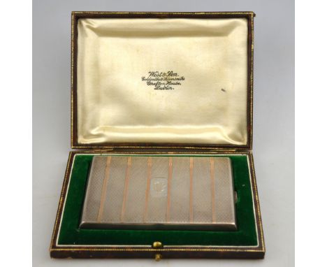 A heavy quality cigarette case with parcel gilt and engine-turned decoration, West & Son, Chester 1924, engraved within: 'Pad