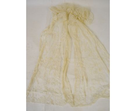 19th century and other lace comprising; a cream needle-run lace long shawl, a similar floral and bow motif shawl, a cream sil