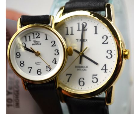 A gent's and a lady's Timex wristwatches to/w ladies gilt metal wristwatch (3) 