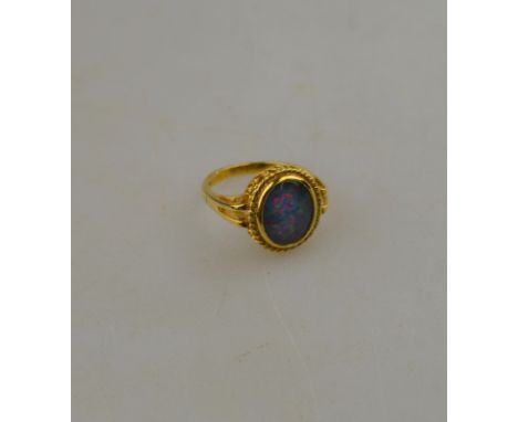 A single stone opal triplet ring, 9ct yellow gold