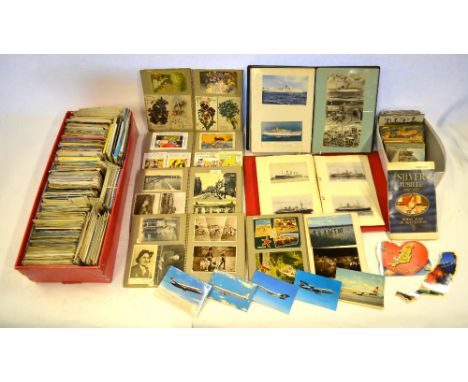 A large quantity of postcards, including ships, saucy seaside, topography, etc. - mostly 1930's - 1950's, loose and in albums