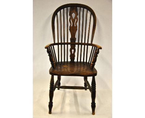 A 19th century elm seat stick back armchair Condition Report Stretchers replaced