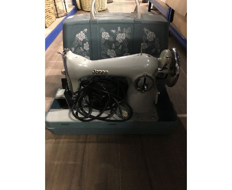 A VINTAGE JONES SEWING MACHINE