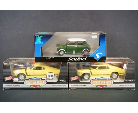 Two Boxed ERTL Collector's edn American Model 1/18 scale diecast 1970 Boss Mustang models, together with a boxed Solido Prest