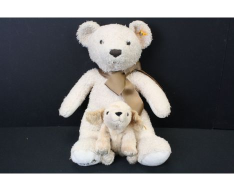 Two Steiff soft toys to include 113376 Teddy Bear Cosy Year with original tag and a lying down dog 