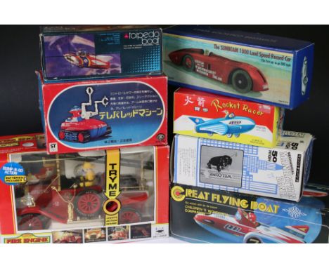 Seven boxed tin plate &amp; plastic models to include New Bright Fire Engine, Schylling The Sunbeam 1000 Land Record Car, Mec