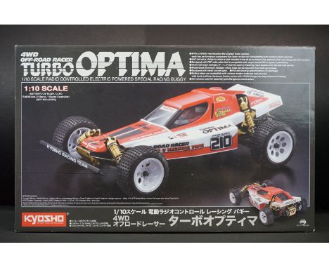 Boxed Kyosho 1/10 R/C 4WD Off Road Racer Turbo Optima radio control car, with instructions 