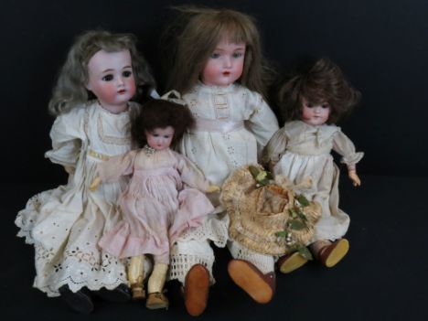 Four early 20th C bisque headed dolls to include Halbig marked K &amp; R, Knauth, etc, showing some wear 