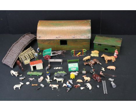 Over 50 Mid 20th C metal farm animals, figures and accessories, mainly Britains, to include horses, cattle, sheep, farm worke
